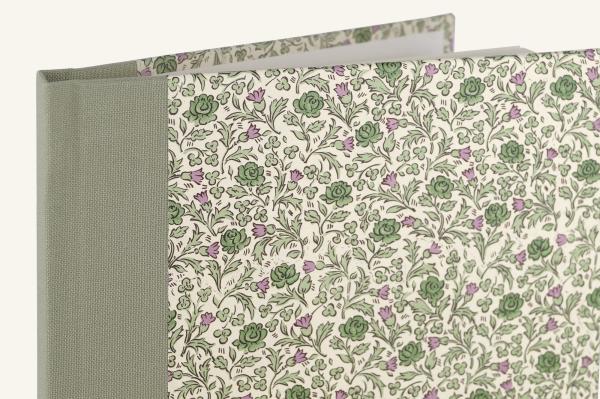 classic notebook with floral motif, green roses, green linen spine, white pages